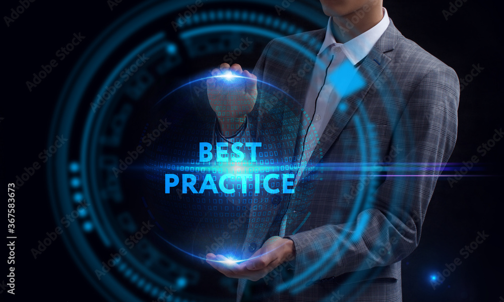 Business, Technology, Internet and network concept. Young businessman working on a virtual screen of the future and sees the inscription: Best practice Business, Technology, Internet and network concept. Young businessman working on a virtual screen of the future and sees the inscription: Best practice