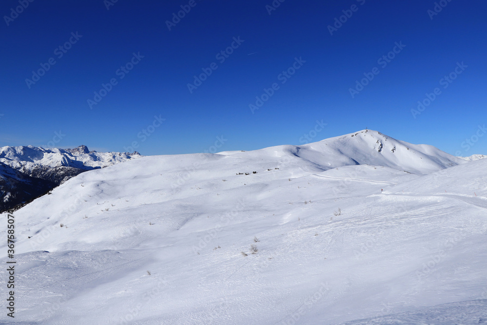 View on freeride in Obertilliach ski resort from Golzentipp mountain to Gripp mountain and down to Rodarm village. Ideal condition on ski alps and some dangerous freeride. Austria, Tyrol View on freeride in Obertilliach ski resort from Golzentipp mountain to Gripp mountain and down to Rodarm village. Ideal condition on ski alps and some dangerous freeride. Austria, Tyrol