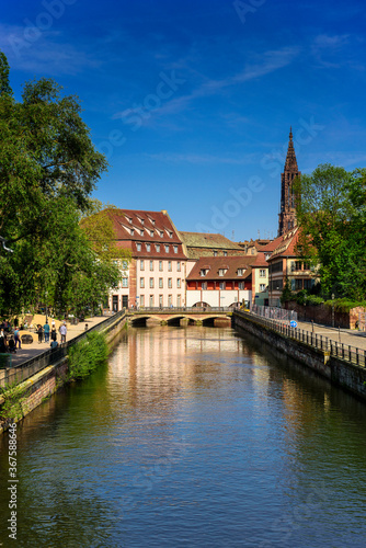 View from the bridge to the canal, embankment and architecture of Strasbourg, Alsace, France