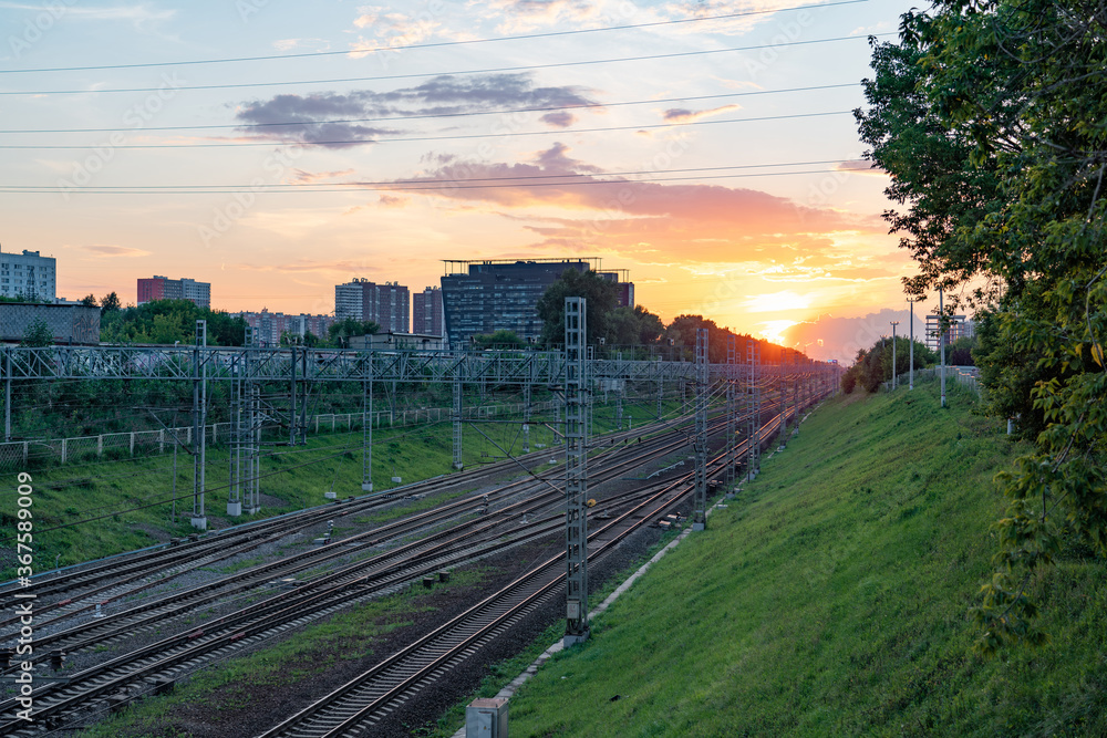 Railroad - Railway at sunset with sun