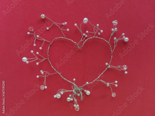 red heart on a red background