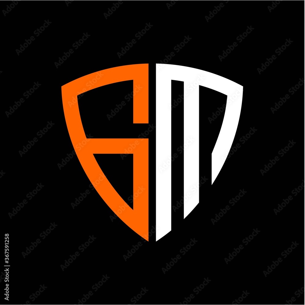 G M initials white orange shield with black background G M initials white orange shield with black background