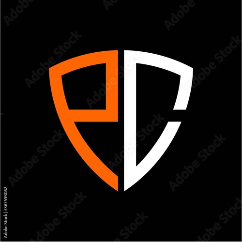  initials white orange shield with black background A B C D E F G H I J K L M N O P I R S T U V W X Y Z