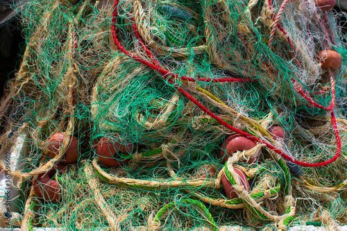 pile of fishing nets in close up © Erich