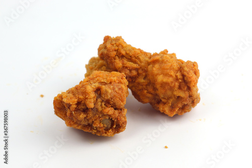 Crispy fried chicken on a white background