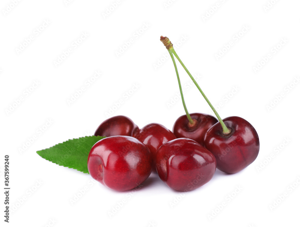 Tasty ripe red cherries with green leaf isolated on white Tasty ripe red cherries with green leaf isolated on white