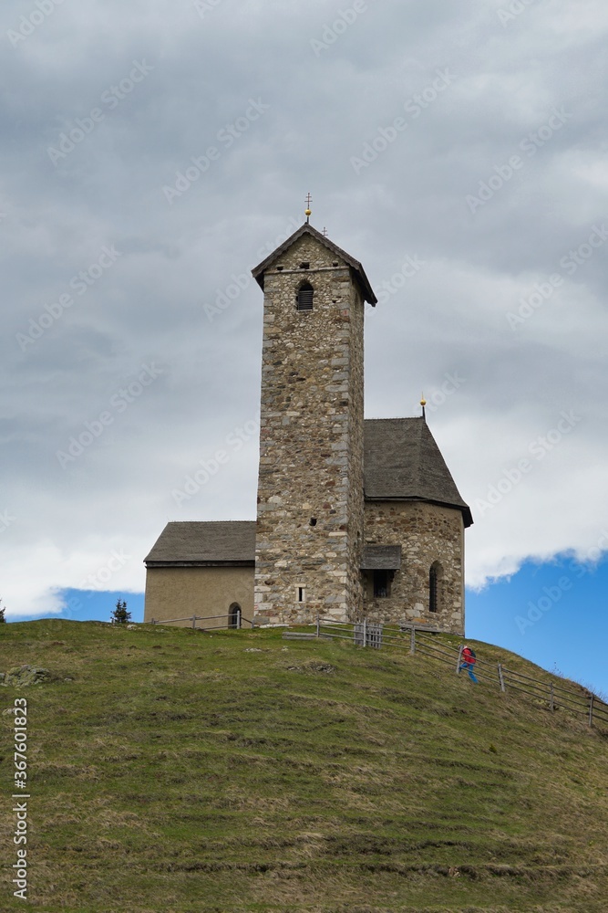 chapel in southern tyrol on top of a hill