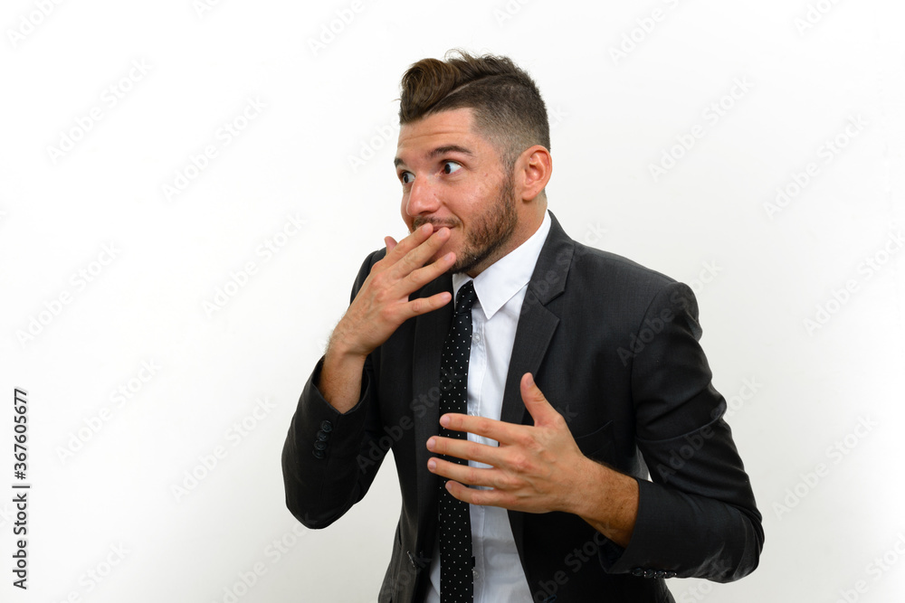 Portrait of handsome bearded Hispanic businessman in suit Portrait of handsome bearded Hispanic businessman in suit
