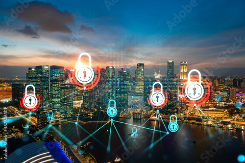 Hologram of Padlock on sunset panoramic cityscape of Singapore, Asia. The concept of cyber security intelligence. Multi exposure.
