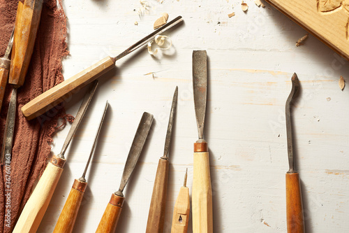 Quadro su tela Collection of a woodcarving chisels arranged work in progress