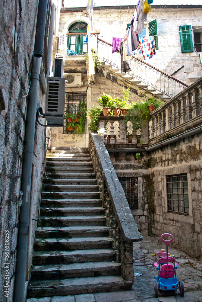 Stairs leading to the apartment in the courtyard Stairs leading to the apartment in the courtyard