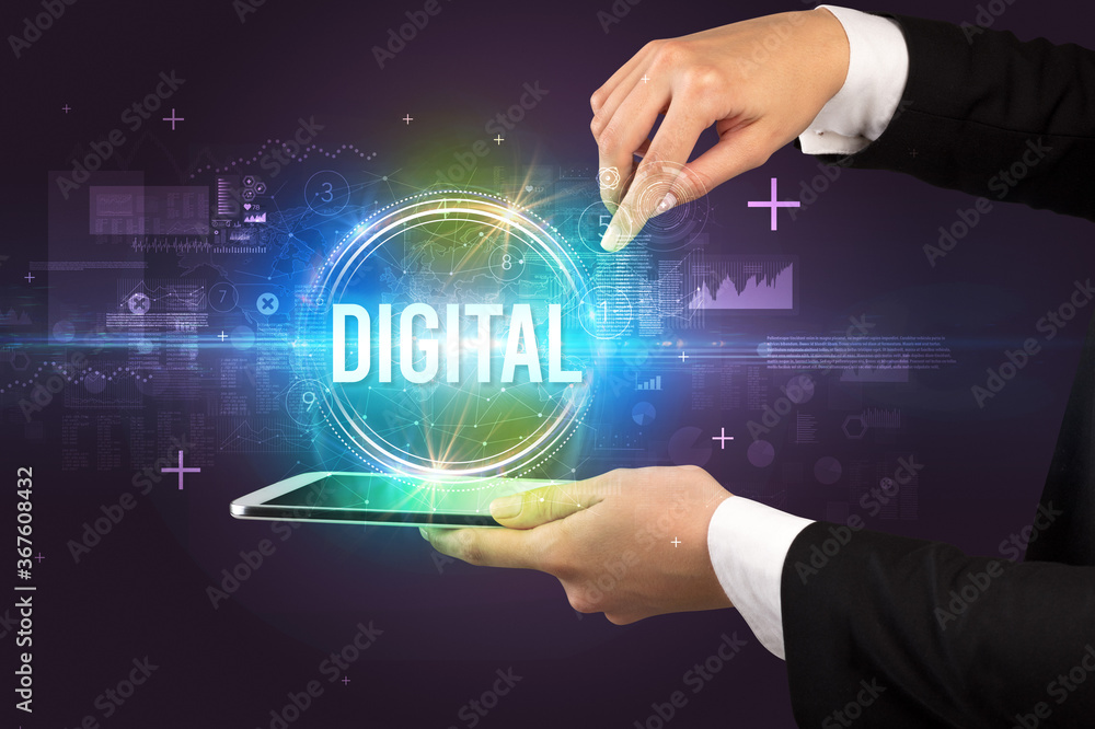 Close-up of a touchscreen with DIGITAL inscription, new technology concept Close-up of a touchscreen with DIGITAL inscription, new technology concept