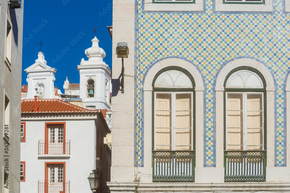 facade covered with azulejos, ceramic tiles, in the district of Alfama in Lisbon Portugal