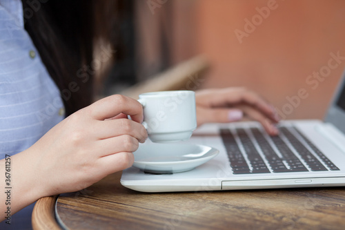 woman working computer and coffee