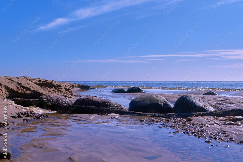 Big stones Baltic sea shore near Tuja in Old Rocks, Veczemju klintis Latvia