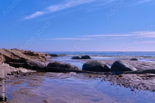 Big stones Baltic sea shore near Tuja in Old Rocks, Veczemju klintis Latvia