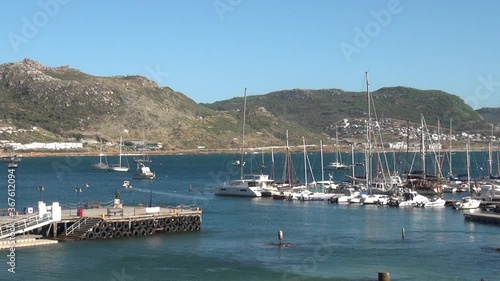 Bright sunny summer day video of Simon's Town harbour, Cape Town in Western Cape Province, South Africa photo