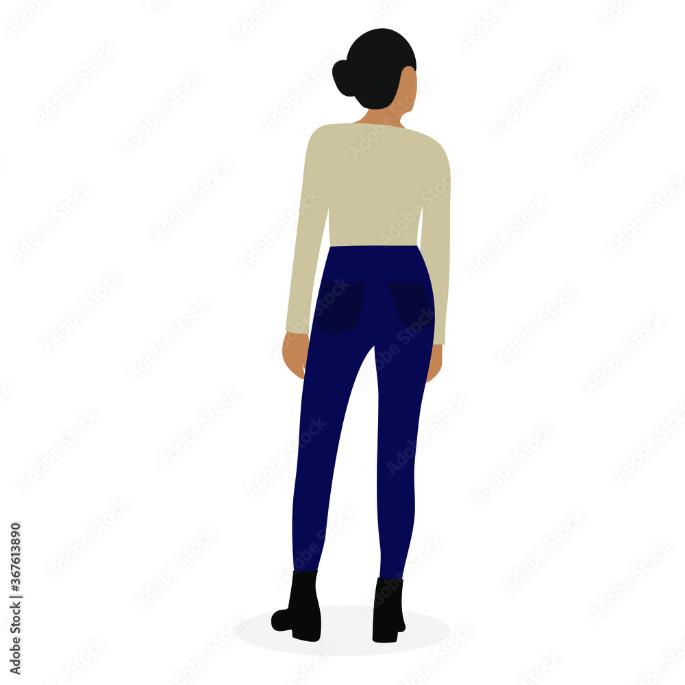 Young woman in jeans and boots stands with her back on a white background