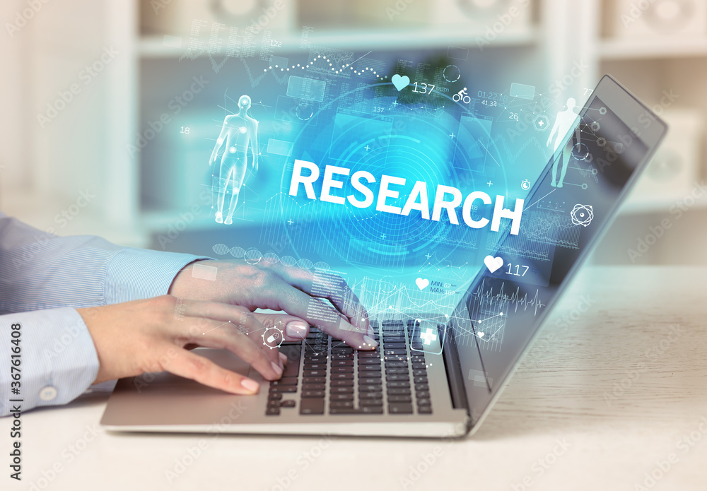 Doctor working a health check with RESEARCH inscription, recording medical test results Doctor working a health check with RESEARCH inscription, recording medical test results