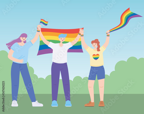 people holding LGBTQ flags support community, gay parade sexual discrimination protest