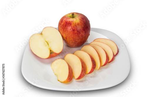 Apple. Slices of apple on the plate.