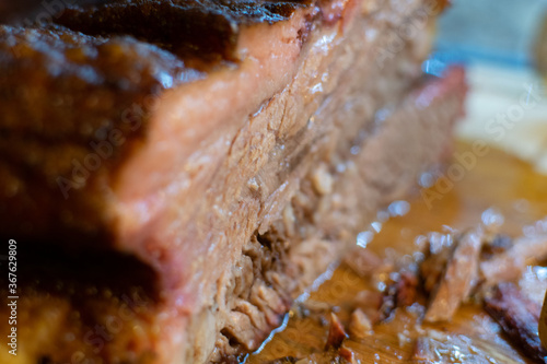 Crosscut section of a smoked beef brisket photo