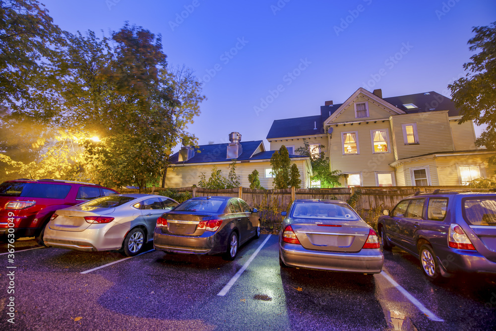 Cars parked at night in a beautiful countryside town
