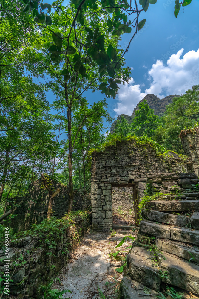 Ruins of abandoned jungle village in China