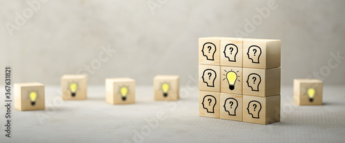 cubes showing a brainstorming session on concrete background photo