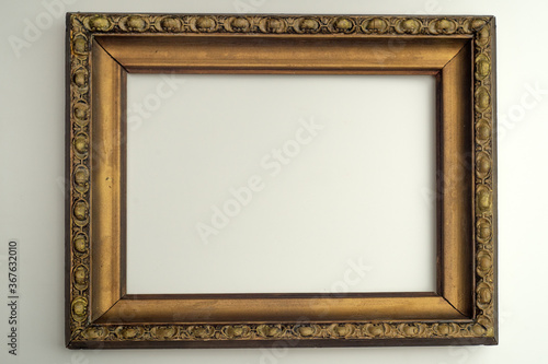 Gilded frame from an old painting on white isolate