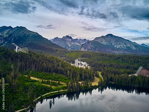 Panoramic view of mountain lake in National Park High Tatra. Strbske pleso, Slovakia, Europe. Beautiful world.