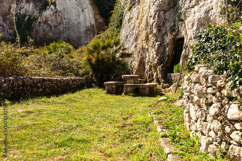 Natural Sights of The Intagliatella Quarry in The Archaelogical Zone of Akrai in Palazzolo Acreide, Province of Syracuse, Italy.  photo