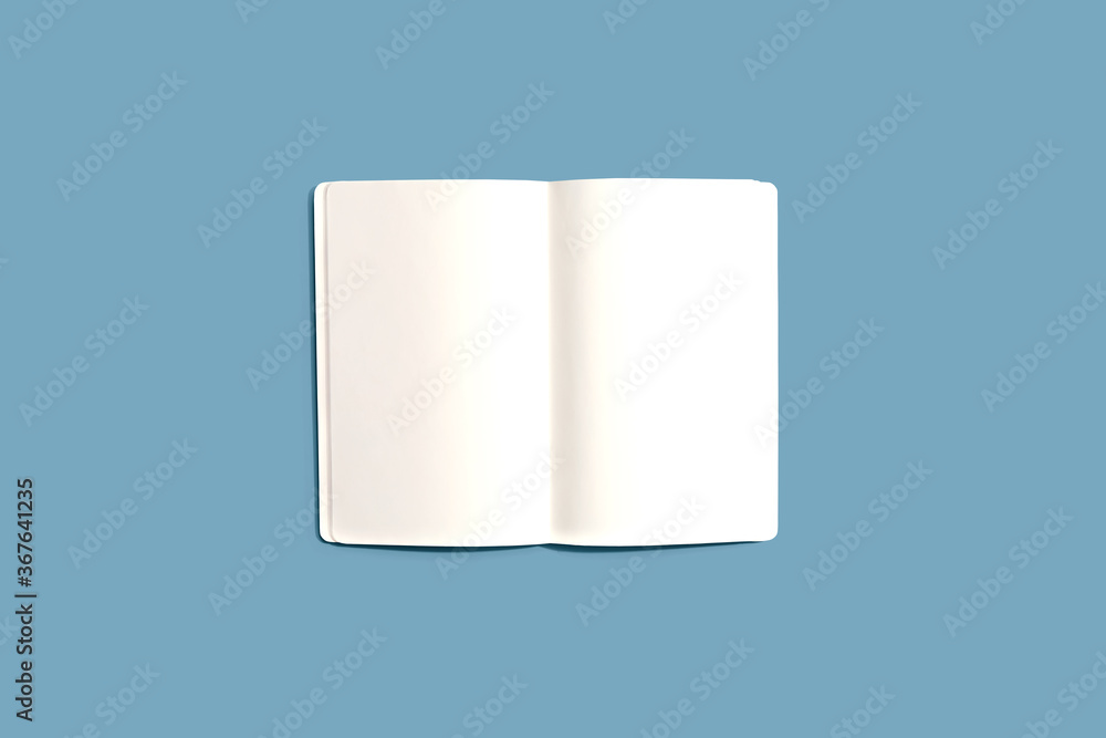 Blank white notebook from above - flat lay Blank white notebook from above - flat lay