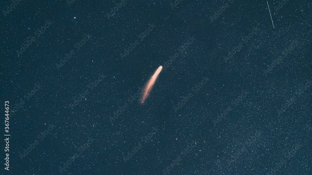 The flighting comet on the starry sky background. hyper lapse