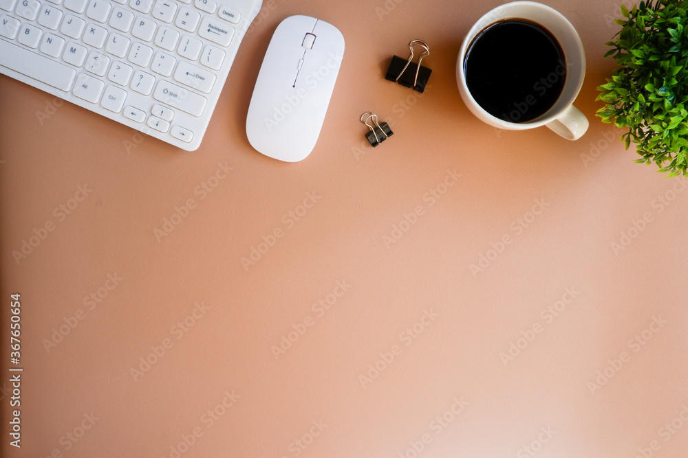 Top view office desk table with the office equipments, computer keyboard and other office supplies on the modern space, flat lay. Top view office desk table with the office equipments, computer keyboard and other office supplies on the modern space, flat lay.