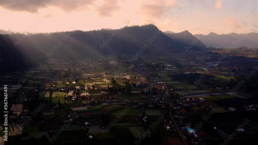 Picture perfect Balinese valley of Kintamani during sunrise, idyllic scenery Picture perfect Balinese valley of Kintamani during sunrise, idyllic scenery