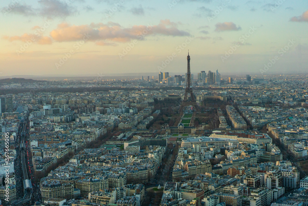 Aerial view of city Paris, the capital in France, at sunset.