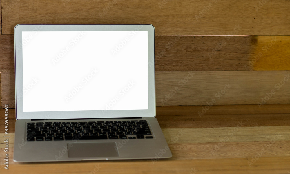 laptop on a wooden table background. laptop on a wooden table background.