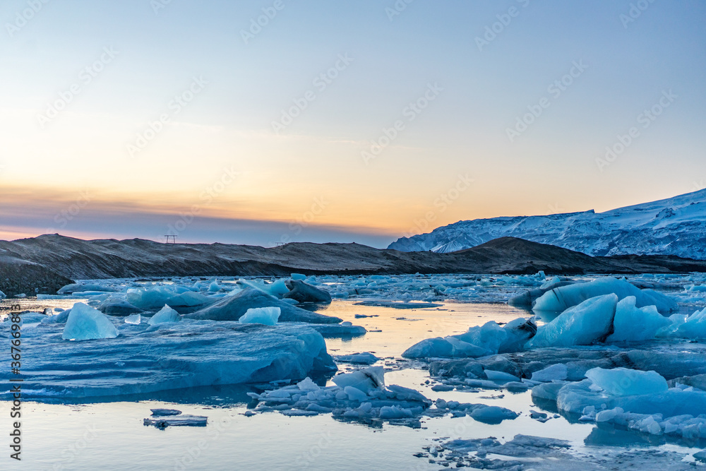 Jokulsarlon, the glacier lake in Iceland, shot in winter time, at sunset.