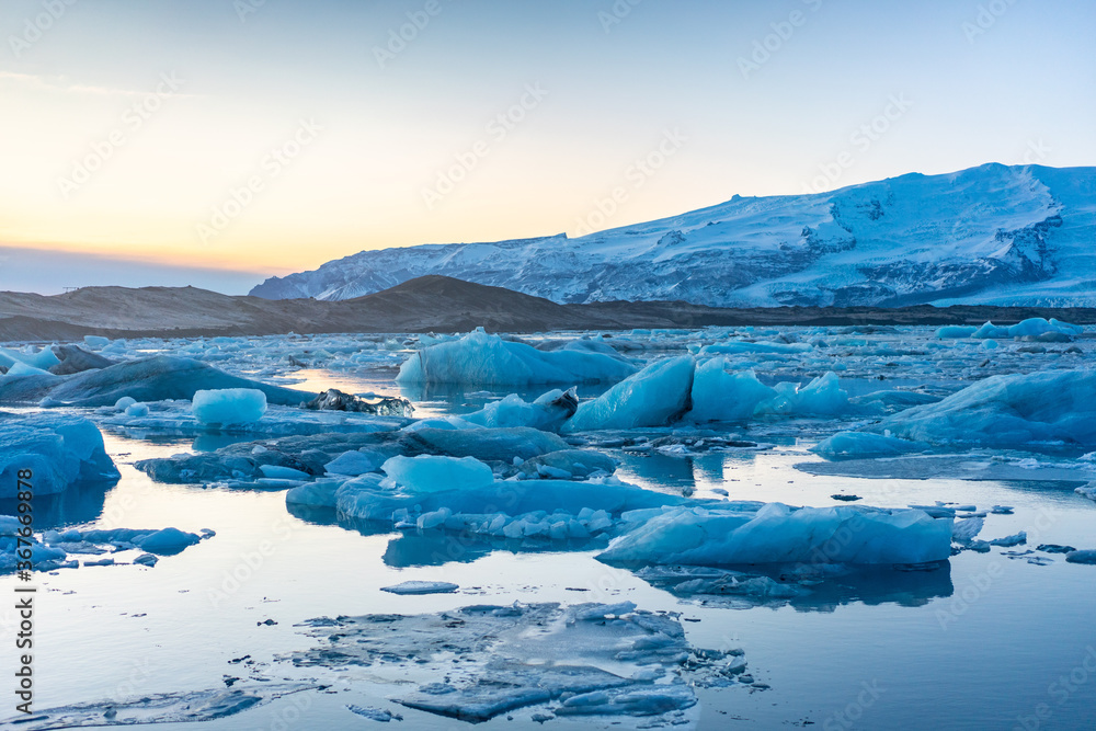 Jokulsarlon, the glacier lake in Iceland, shot in winter time, at sunset.