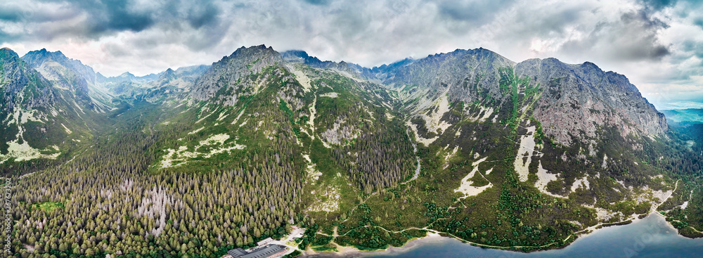 Beautiful panoramic view of Popradske pleso (once called Rybie pleso) is a mountain lake of glacial origin located in the High Tatras, northern Slovakia, Europe. Beautiful world.