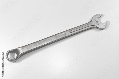 Big isolated spanner on white background © HC FOTOSTUDIO
