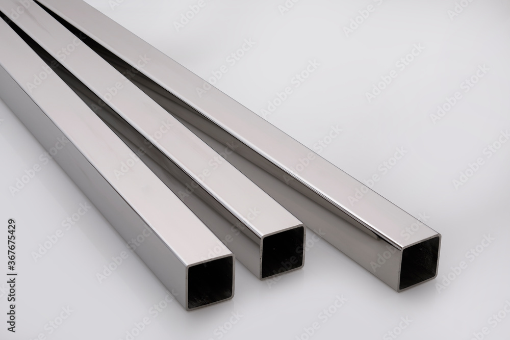 steel tubes and pipes on a white base steel tubes and pipes on a white base