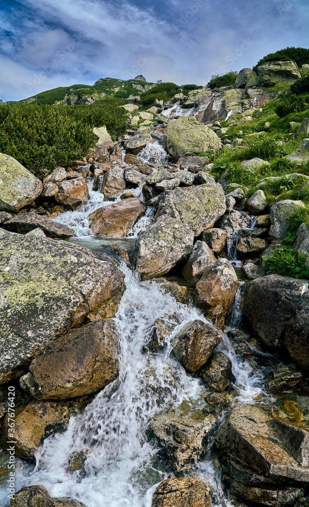 Mountain stream in High Tatras National Park, Slovakia, Europe. Beautiful world. Mountain stream in High Tatras National Park, Slovakia, Europe. Beautiful world.