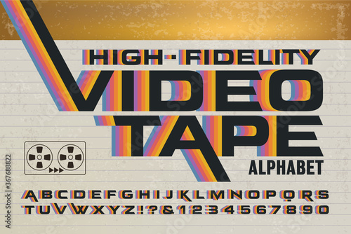 A Retro Alphabet with 1980s Style Rainbow Effects. High-Fidelity Videotape Packaging Font with Colorful Stripes on a Video Cassette Box. photo