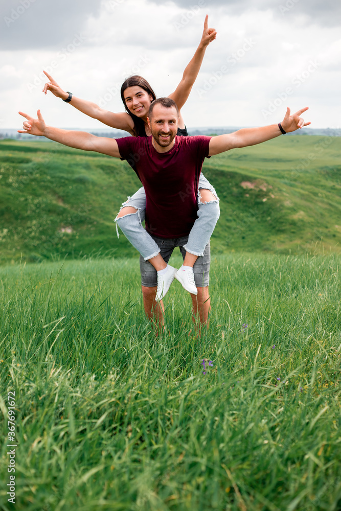 Happy couple in summer on vacation. Lovers laugh.
Happy guy and girl. Beautiful girl with long dark hair
and a young guy. Happy couple concept. Environment concept, nature Happy couple in summer on vacation. Lovers laugh.
Happy guy and girl. Beautiful girl with long dark hair
and a young guy. Happy couple concept. Environment concept, nature