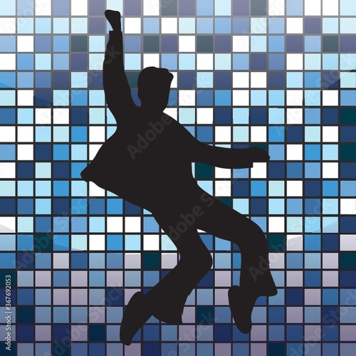 silhouette of a man striking dance pose