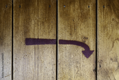 Wood painted direction arrow