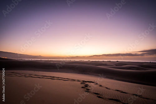 Spectacular Sunrise Sandy dunes in famous natural Maspalomas beach. Gran Canaria. Spain