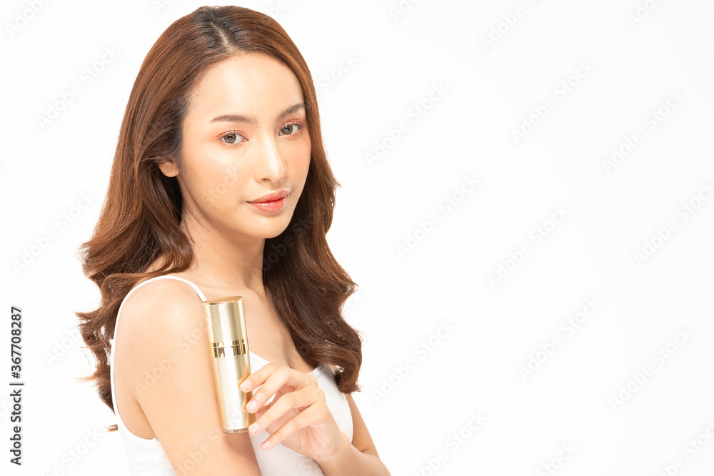 Beauty asian woman hold bottle cosmetic cream lotion and cheerful. Beauty asian woman hold bottle cosmetic cream lotion and cheerful.